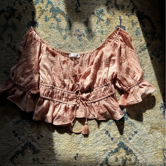Shop Neighbor Pink Ruffled Off-Shoulder Crop Top - Picture 1 of 8